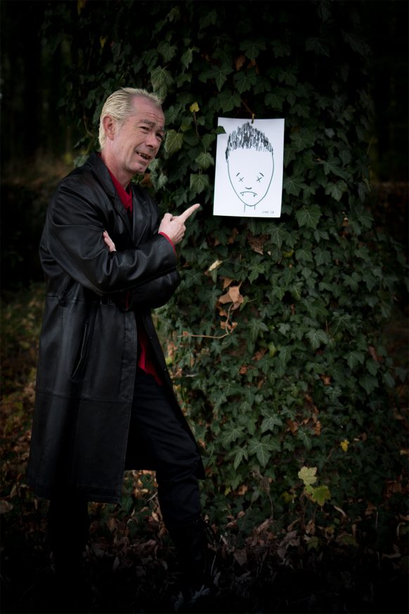 Spike and his drawing of Captain Forehead